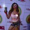 Rakhi Sawant poses for the media at Zoom Holi Bash