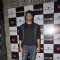 Hanif Hilal poses  for the media at Tom Tailor and Jabong Bash