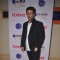 Karan Johar poses for the media at the Cover Launch of Ciroc Filmfare Glamour & Style Awards Issue