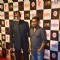 Shoojit Sircar and Amitabh Bachchan pose for the media at the Success Bash of Piku