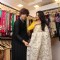 Rohit Showcases the Collection to Bhagyashree