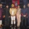 The Judges and Host of The Voice India Pose with Daler Mehndi