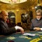 Amitabh Bachchan sitting in casino