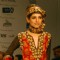 A model catwalks in an outfit design by Kaushik and Pallob during the Kolkata Fashion Week in Kolkata on 10th Sep 2009