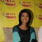 Bollywood actress Priyanka chopra poses for shutterbugs after unveiling the music of "Pyaar Impossible" at a radio station in mumbai today afternoon