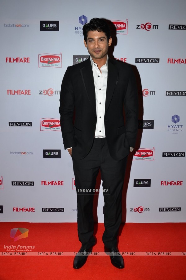 Siddharth Shukla poses for the media at Filmfare Nominations Bash