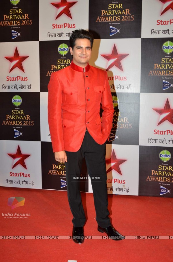 Karan Mehra poses for the media at Star Parivaar Awards 2015